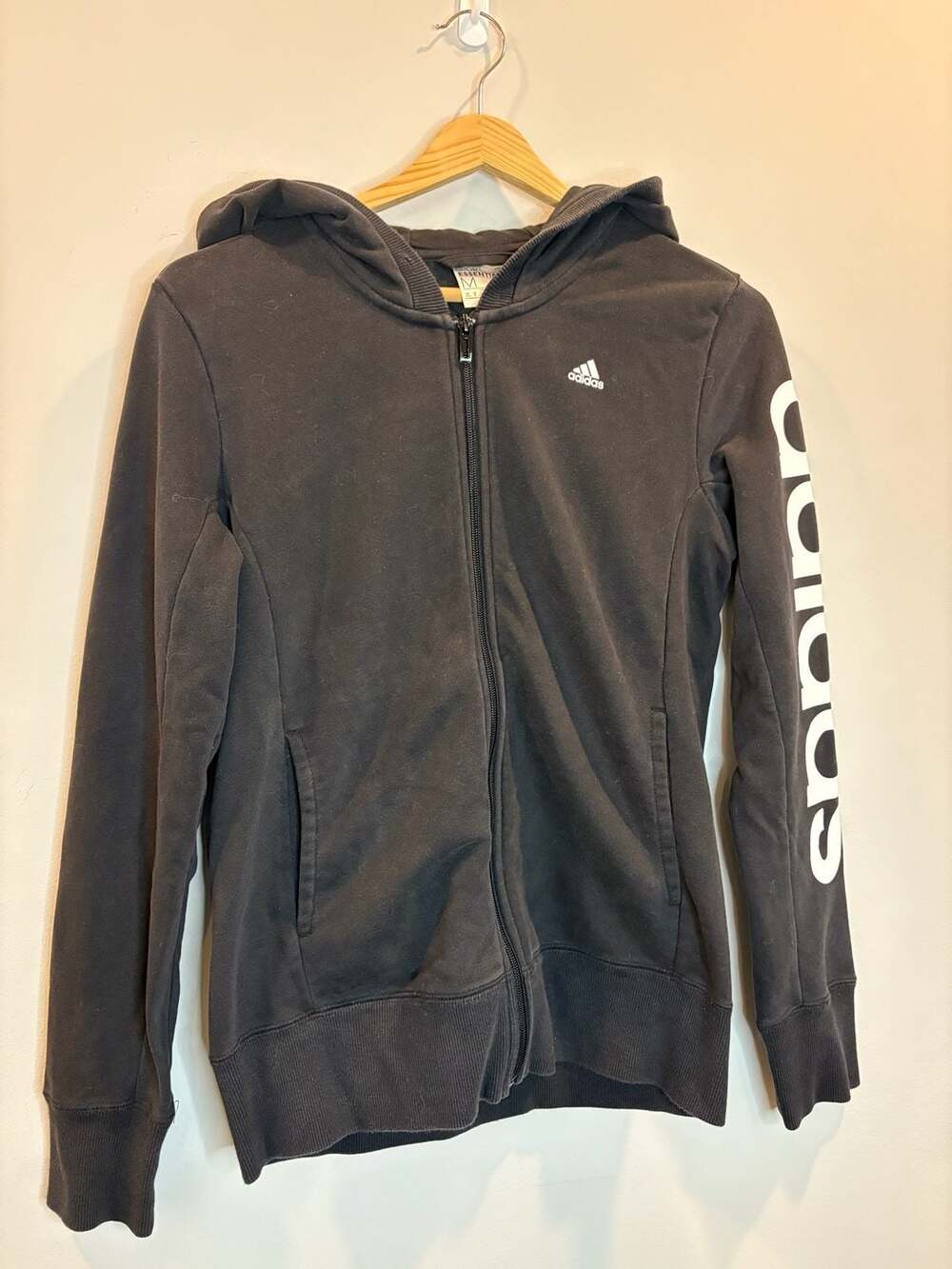 Adidas Essentials zip-up hoodie in black